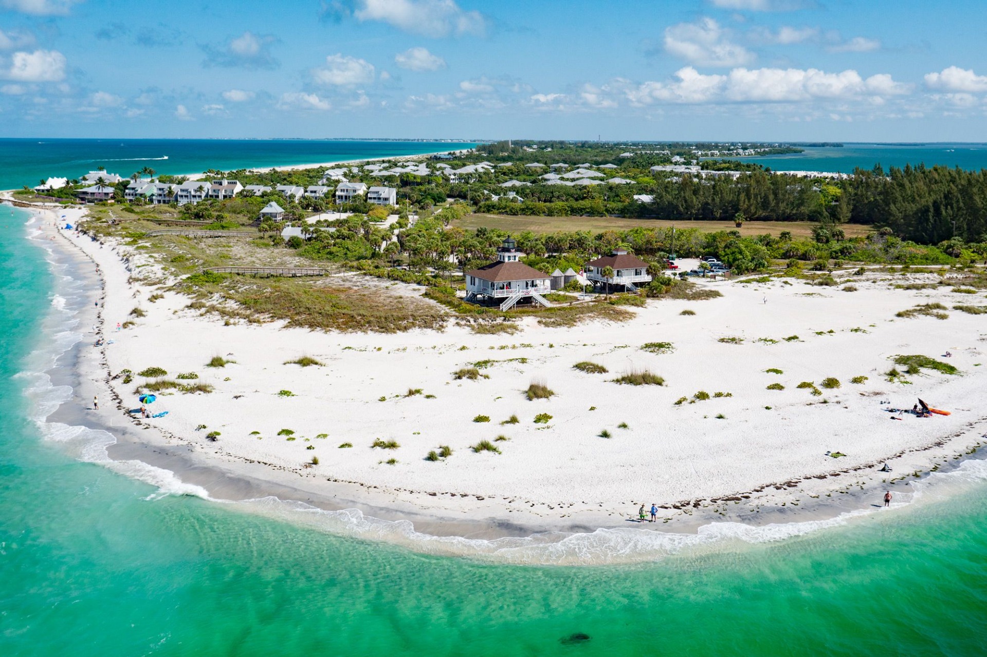 Aerial view of the south end of Gasparilla Island, showing the Port Boca Grande Lighthouse, the white Gulf beaches and the pass, Boca Grande, Florida